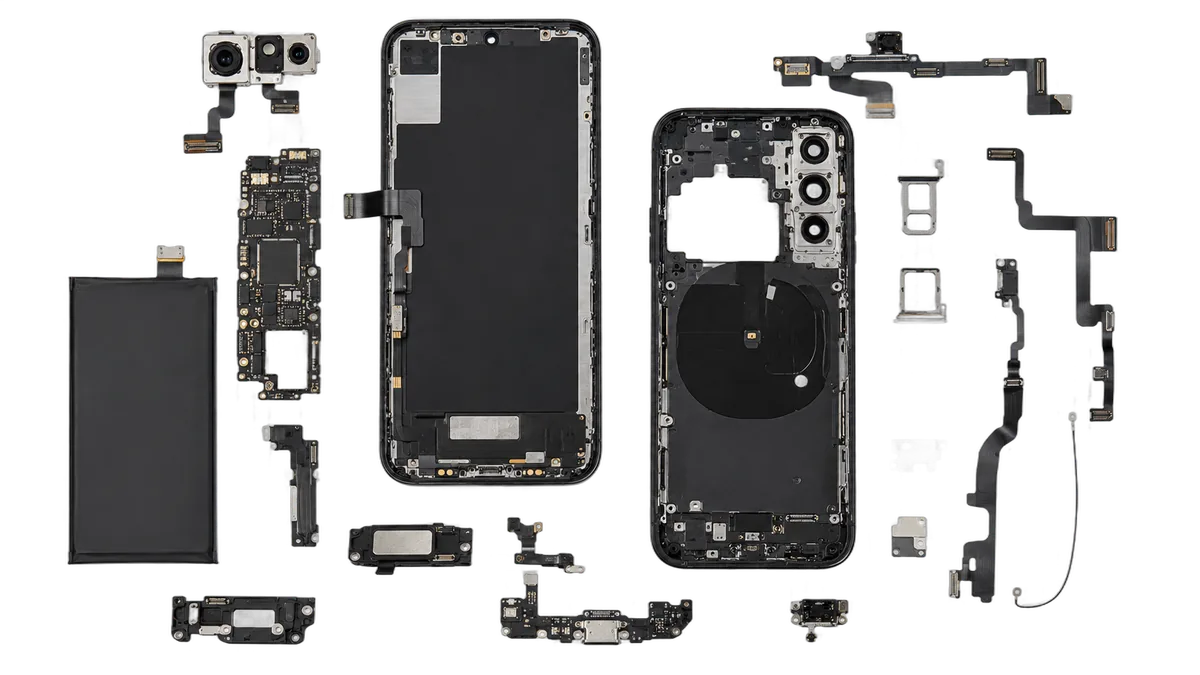 Disassembled smartphone with every component laid out